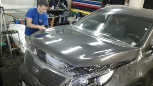 Kia Sportage - бронирование капота полиуретановой антигравийной пленкой