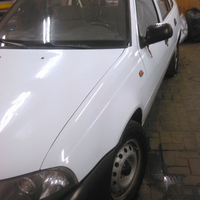 Daewoo Nexia — оклейка белой глянцевой пленкой для такси