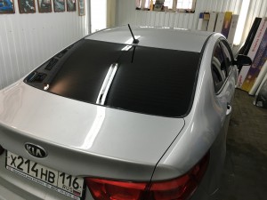 Kia Rio - тонировка задней части авто пленкой Johnson, сертифицированная установка автосигнализации ...