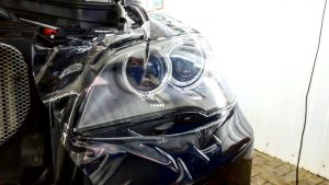 Бронирование антигравийной пленкой передних фар - BMW X6